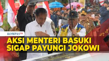 Aksi Menteri Basuki Sigap Payungi Jokowi saat Resmikan Jalan di Sulteng