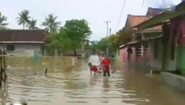 Kilas Indonesia: Banjir Merendam Pemukiman Warga di Tebet dan Karawang
