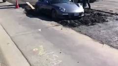 This driver finds himself trapped in fresh cement with his Porsche ... Failed