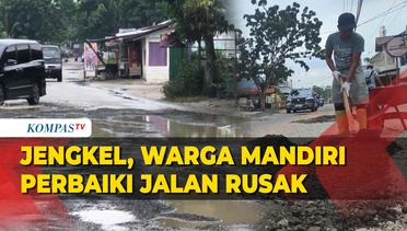 Begini Aksi Warga Riau saat Perbaiki Jalanan yang Rusak dengan Dana Pribadi