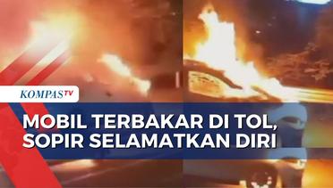 Petugas Damkar Berjibaku Padamkan Mobil Sedan yang Terbakar di Tol Jakarta-Tangerang