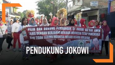 Pendukung Jokowi Jalan Santai dan Bersihkan Sampah Jaktim