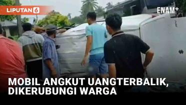 Mobil Pengangkut Uang Terbalik di Padang Pariaman dan Dikerubungi Warga