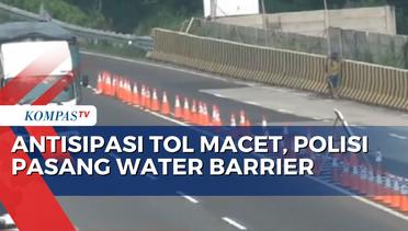 Polisi Pasang Water Barrie di Tol Japek, Antisipasi Lonjakan Kendaraan Libur Tahun Baru
