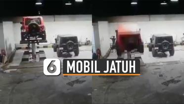 Duh, Mobil Jeep Jatuh dari Hidrolik Saat Dicuci