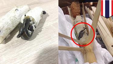 Wanita temukan kadal dalam nasi bakar bambu - TomoNews