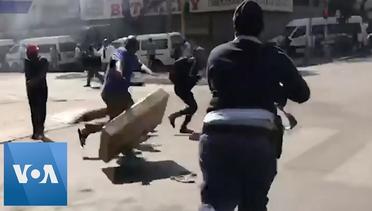 Police Fire Rubber Bullets Amidst Riots in South Africa