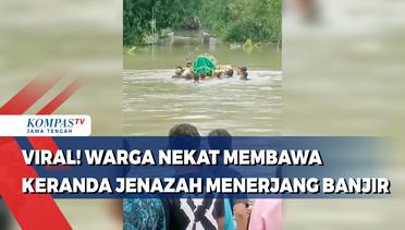 Viral! Warga Nekat Membawa Keranda Jenazah Menerjang Banjir