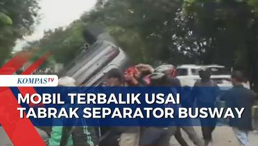 Tabrak Separator Bus Transjakarta, Sebuah Mobil Terguling di Tengah Jalan