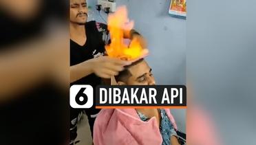 Di Salon Ini, Rambut Pelanggan Dibakar Pakai Api