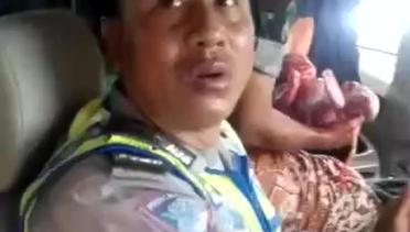 Istri prajurit TNI melahirkan dalam mobil dibantu Polisi