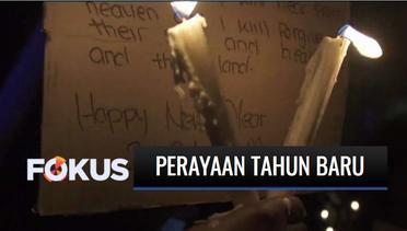 Sukarelawan di Afrika Selatan Menyalakan Lilin untuk Hormati Korban Covid-19 di Malam Tahun Baru | Fokus