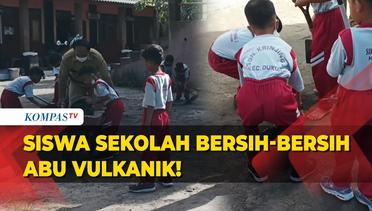 Siswa SD Spontan Bersihkan Abu Vulkanik Gunung Merapi yang Menutupi Area Sekolah