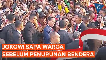Jokowi Sapa Masyarakat di Luar Istana Sebelum Penurunan Bendera