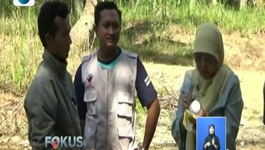 Petugas di Pacitan Ambil Sampel Air Sungai Diduga Penyebab Virus Hepatitis - Fokus