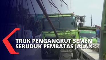 Sopir Kaget saat Ada Motor Menyalip, Truk Pengangkut Semen Tabrak Pembatas Jalan di Tambun!
