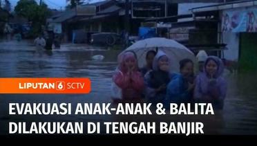 Evakuasi Anak-Anak Dilakukan di Tengah Genangan Banjir di Kota Padang | Liputan 6