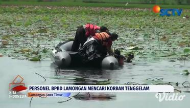 Personel BPBD Lamongan Mencari Korban Tenggelam