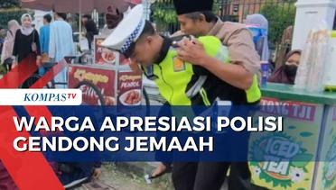 Momen Heroik! Polisi Gendong Jemaah Disabilitas untuk Laksanakan Shalat Idulfitri