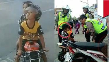 Dua bocah TK ditilang polisi karena kendarai motor balap mini - TomoNews