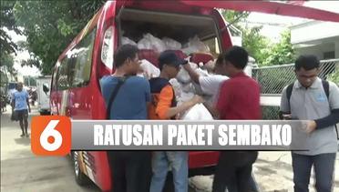 YPP SCTV-Indosiar Beri Ratusan Paket Sembako di Kampung Melayu