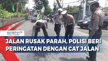 Jalan Rusak Parah, Polisi Beri Peringatan dengan Cat Jalan