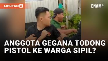 Viral! Pria Berkaus Polisi Todongkan Pistol ke Warga Lampung