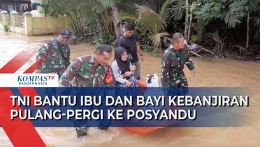 Terhambat Banjir, TNI Bantu Ibu dan Bayi di Desa Jaranih Pulang Pergi ke Posyandu Gunakan Perahu