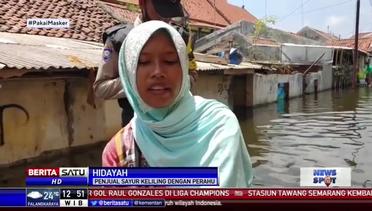 Banjir Tak Kunjung Surut, Pedagang di Pekalongan Jualan Pakai Perahu