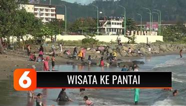 Warga Padang Penuhi Pantai Puruih Meski PSBB Masih Berlaku