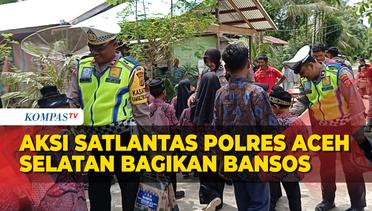 Peduli Sesama, Satlantas Polres Aceh Selatan Bagikan Bansos ke Warga