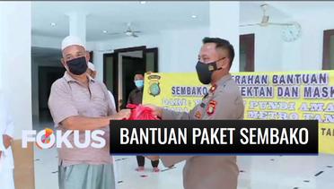 YPP SCTV-Indosiar Bersama Polsek Metro Tanah Abang Bagikan Ratusan Paket Sembako dan Masker Kain | Fokus
