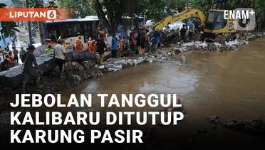 Tumpukan Karung Pasir Tutup Sementara Tanggul Kalibaru yang Jebol di Jakarta Timur