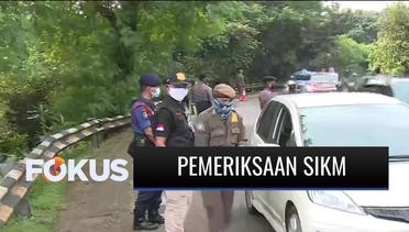 Petugas Memeriksa SIKM Warga yang Memasuki Jakarta