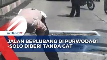 Belum Bisa Diperbaiki, Jalan Berlubang di Jalur Purwodadi-Solo Diberi Tanda Cat oleh Polisi