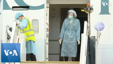 Virus-Hit Japan Cruise Ship Passengers Arrive Home to Hong Kong