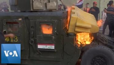 Iraqi Protesters Burn Humvee in Third Day of Protests