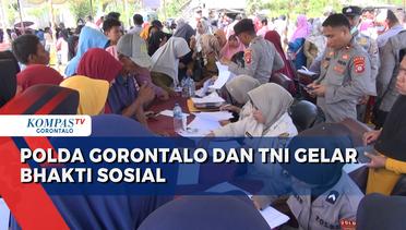 Polda Gorontalo dan TNI Gelar Bakti Sosial Kepada Masyarakat Sekitar Lokasi Pertambangan Pohuwato