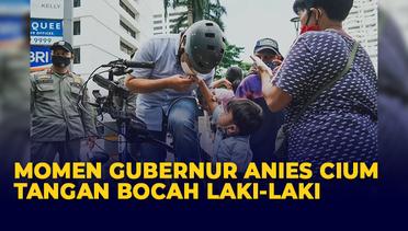 Momen Gubernur Anies Cium Tangan Bocah Laki-laki Saat Bersepeda