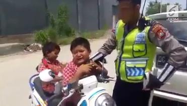Terciduk Naik Motor, Bocah SD Nangis dan Cium Tangan Polisi