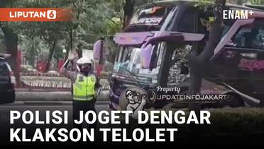 Gokil! Polisi Lalu Lintas Berjoget saat Dengar Klakson Telolet Bus