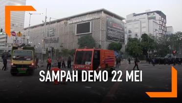 Pasukan Oranye Mulai Bersihkan Sampah Sisa Demo 22 Mei