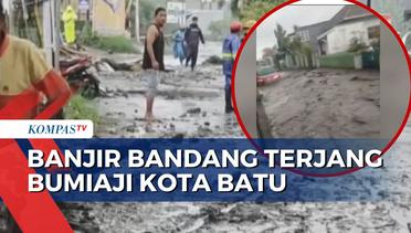 Banjir Surut, Warga Kota Batu Mulai Bersihkan Lumpur dan Material yang Masuk Rumah