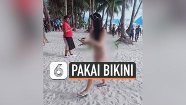 Turis Ditangkap Karena Memakai Bikini di Pantai 