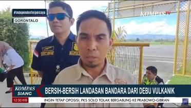 Petugas Gabungan Bersihkan Abu Vulkanik di Landasan Pacu Bandara Djalaludin Gorontalo