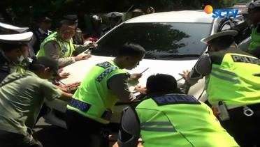 Alasan Tak Punya SIM, Pengemudi Mobil yang Tabrak Petugas Ditangkap - Liputan6 Siang