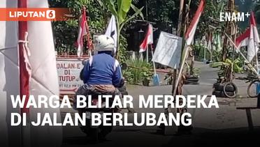 Protes Jalan Rusak, Warga Blitar Pasang Bendera Indonesia di Jalan Berlubang