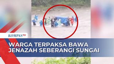Terhambat Akses, Warga Terpaksa Bawa Jenazah Seberangi Sungai Menuju ke Rumah Duka