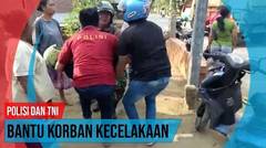 Polisi dan TNI Bantu Korban Kecelakaan