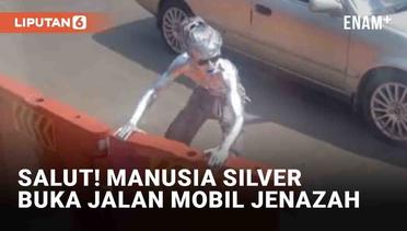 Aksi Sigap Manusia Silver Buka Jalan untuk Mobil Jenazah di Depok